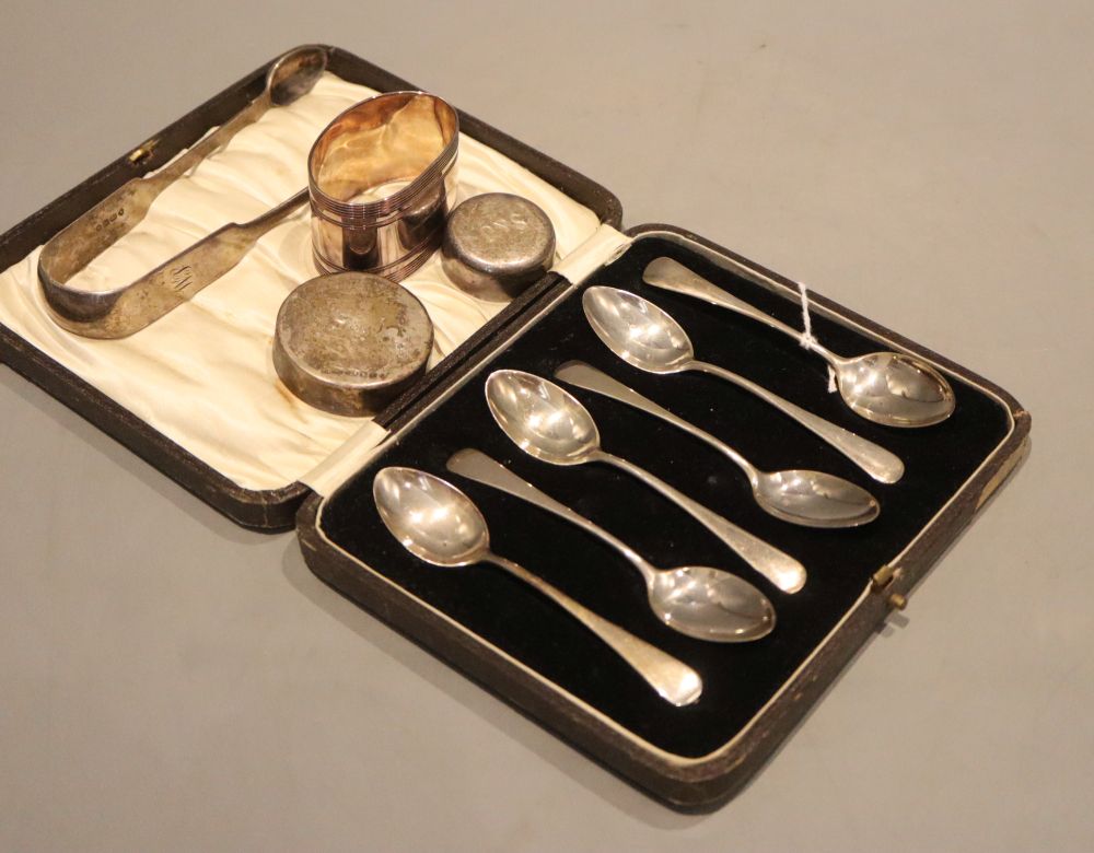 A cased set of six silver teaspoons, Birmingham, 1927, two modern silver lids by S.J. Phillips, napkin ring & tongs.